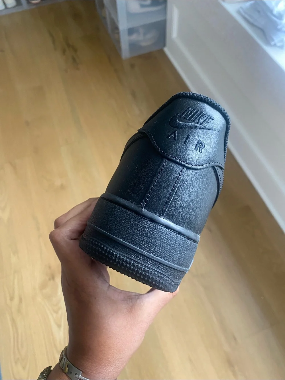 Nike Air Force’s Black Men’s Low-Top Leather Sneakers